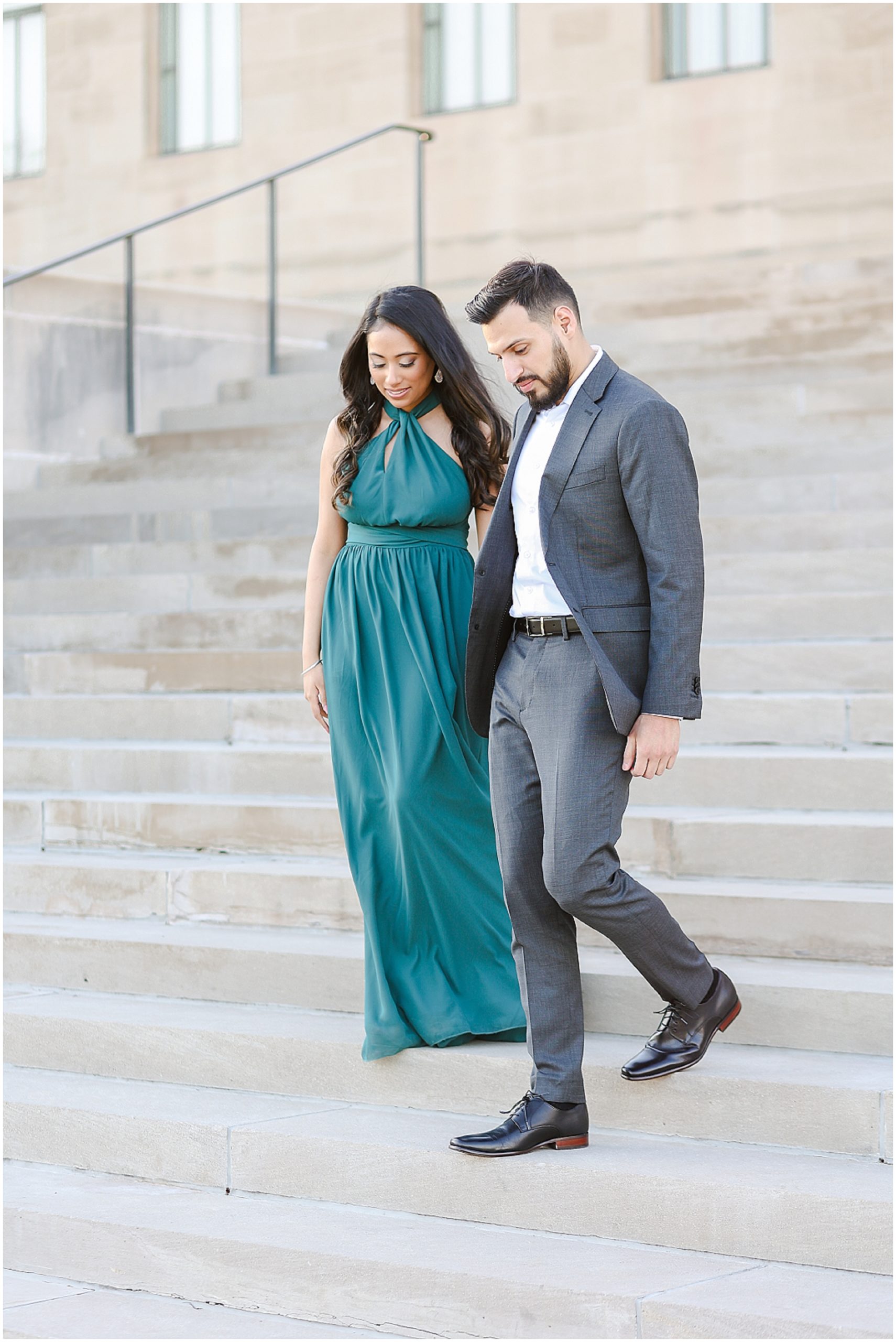 walking down the stairs - Spring Engagement Session in Kansas City - What to wear for portraits - where to take your engagement photos - mariam saifan photography - kaman and byrant indian engagement photos  - stl and florida wedding photographer for indian weddings