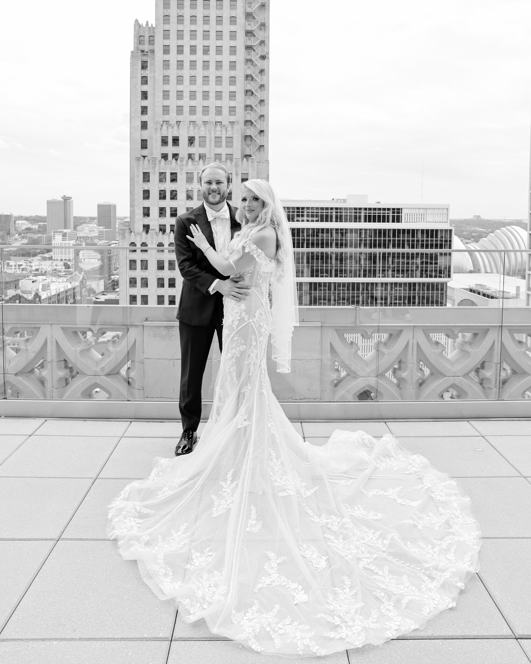 Modern wedding portraits at Hotel Kansas City featuring a classic and elegant celebration - Rooftop Wedding at Hotel Kansas City - Wedding Photographer