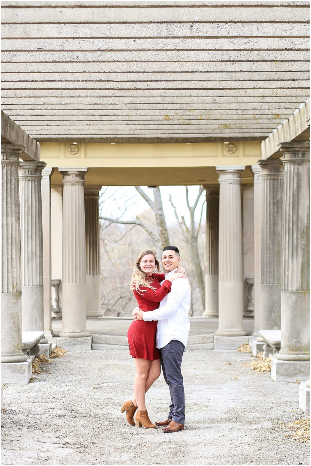 COUPLE HUGGING AT COLONNADE IN KANSAS CITY
