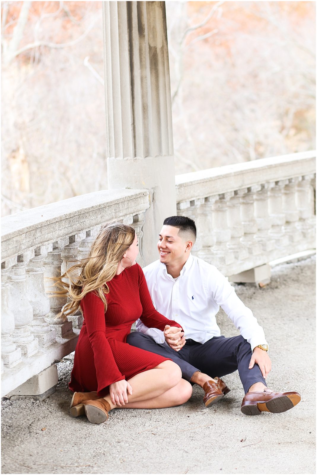 COUPLE IN LOVE AT KANSAS CITY COLONNADE FOR THEIR ENGAGEMENT PORTRAITS WITH MARIAM SAIFAN PHOTOGRAPHY - KC WEDDING AND PORTRAIT PHOTOGRAPHER