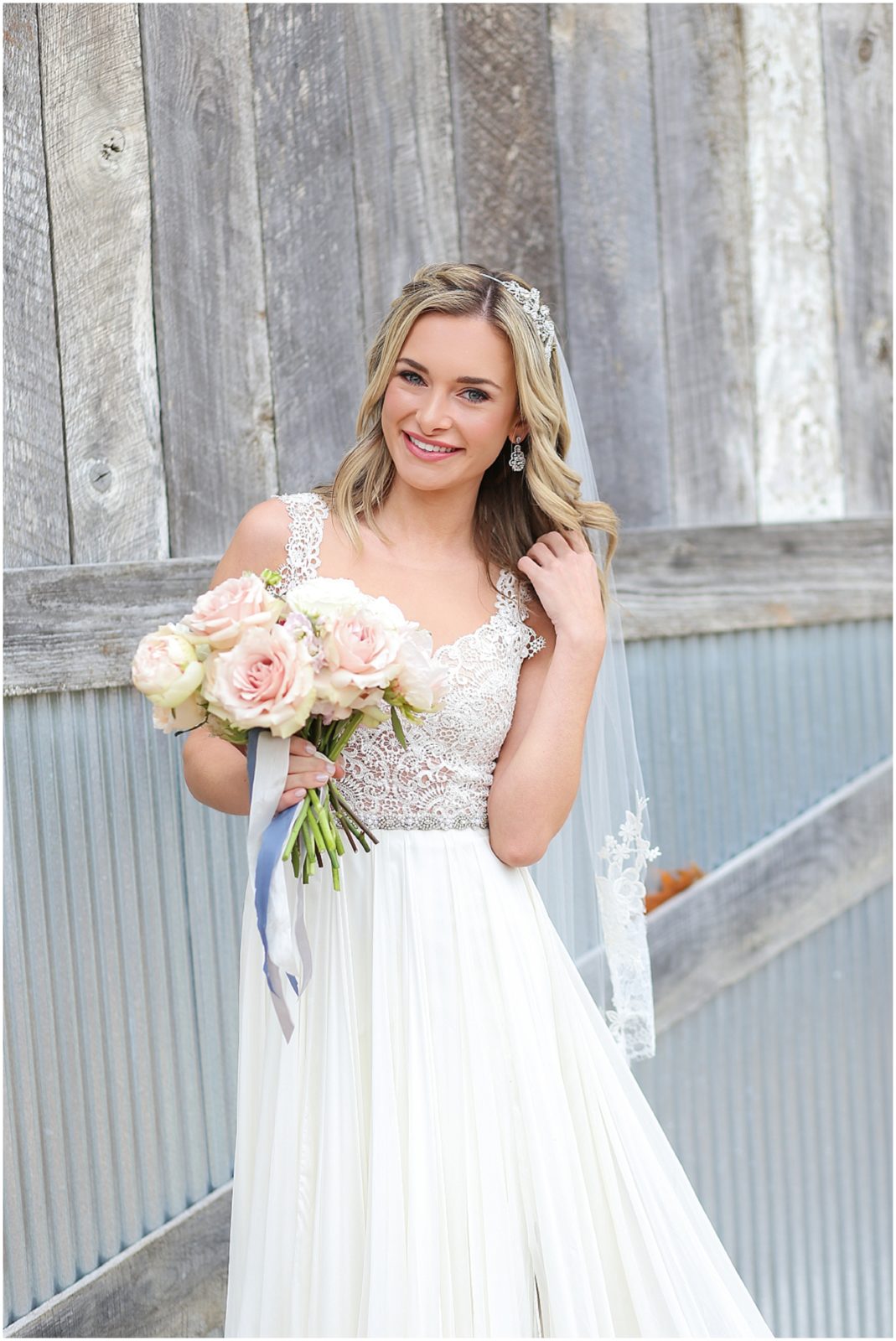 LACE WEDDING DRESS ON BEAUTIFUL BRIDE AT THE BARN AT RIVERBEND - BARN WEDDING IN KANSAS CITY - ALL PHOTOS BY MARIAM SAIFAN PHOTOGRAPHY - BLUE BOUQUET - BLUSH FLOWERS