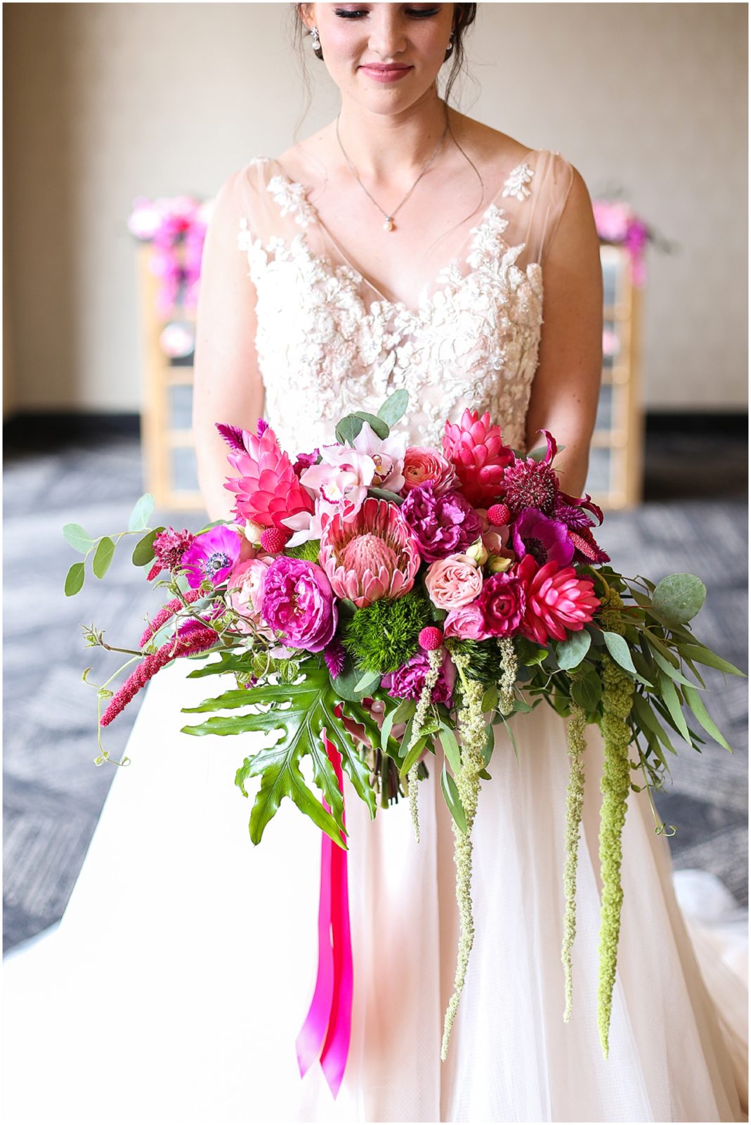HOT PINK WEDDING BOUQUET AT THE POWER AND LIGHT GRAND HALL - KANSAS CITY WEDDING PHOTOS BY MARIAM SAIFAN PHOTOGRAPHY