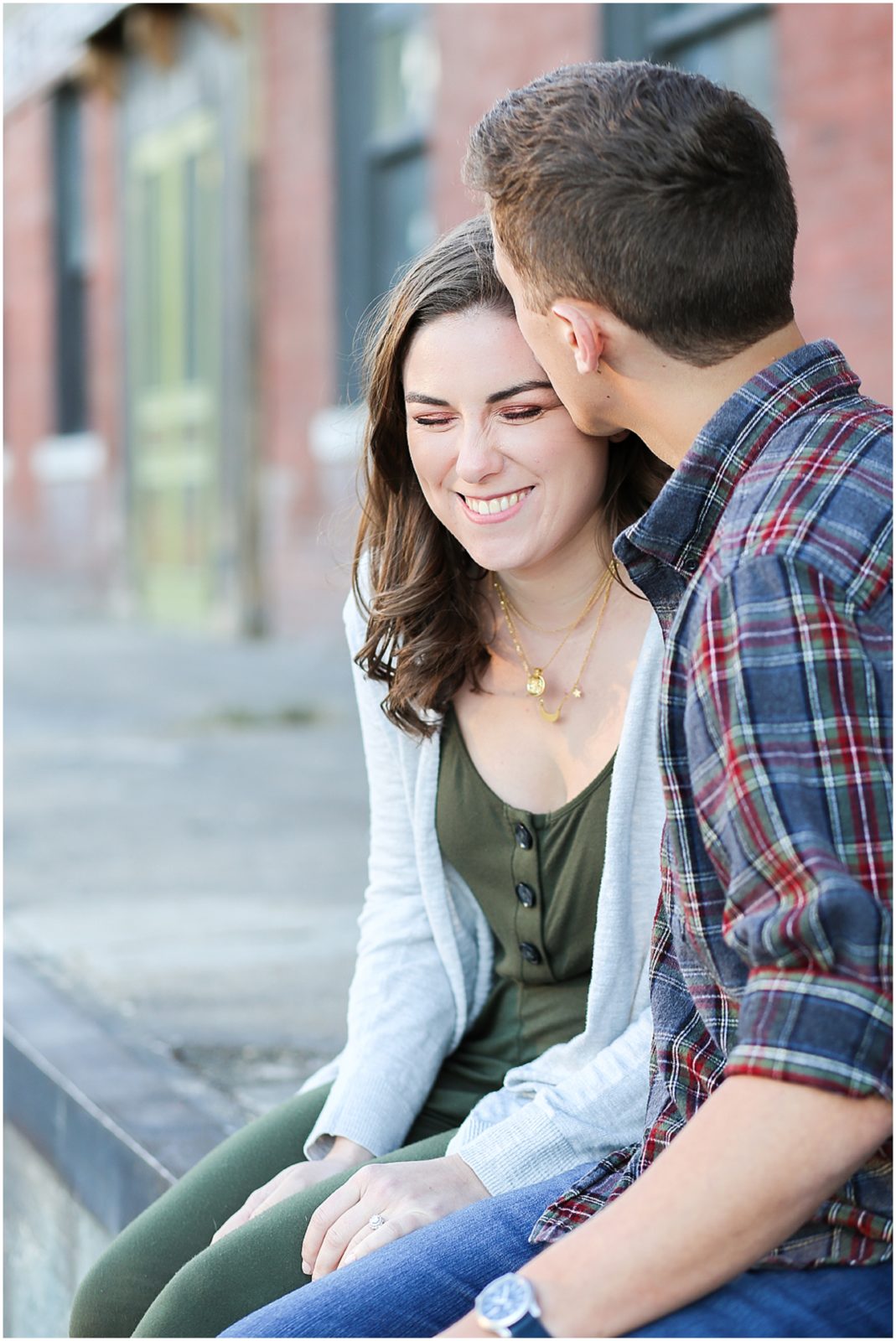 laughing bride - Avery and Jack Engagement Session - Kansas City West Bottoms Engagement Portraits - KC Wedding Photographer - Olathe Lenexa Leawood Kansas Wedding Photography and Video  - Mariam Saifan Photography 