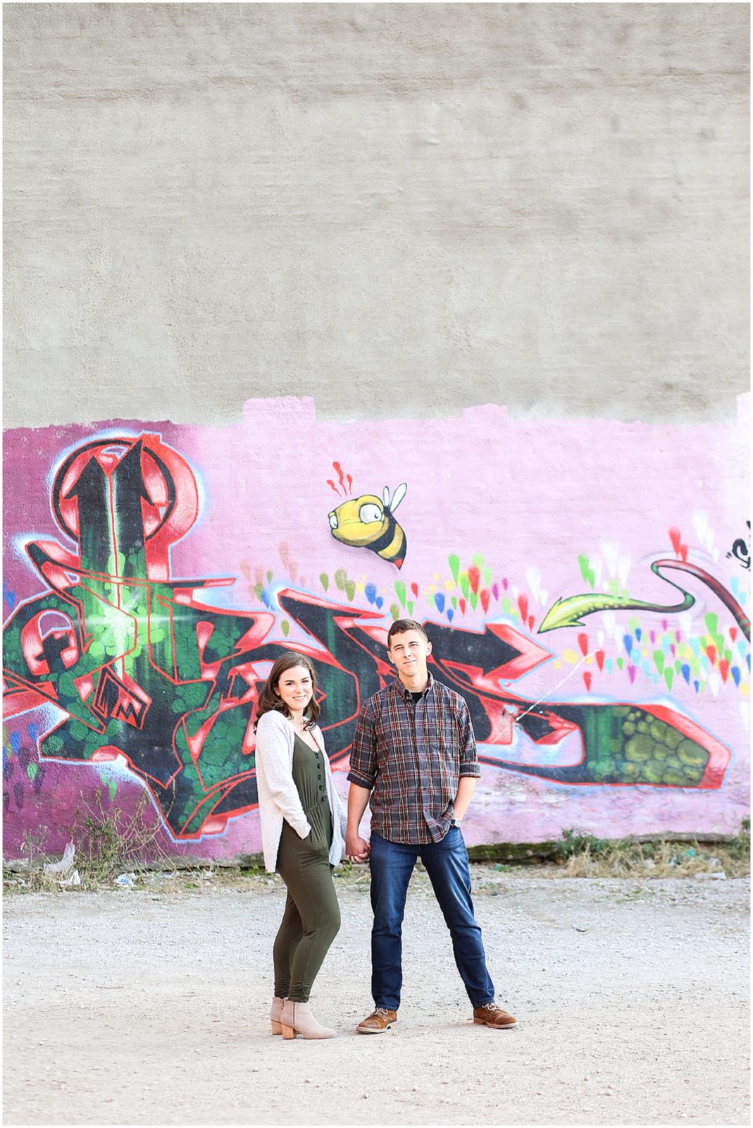 graffiti wall - the bride and the bauer - Avery and Jack Engagement Session - Kansas City West Bottoms Engagement Portraits - KC Wedding Photographer - Olathe Lenexa Leawood Kansas Wedding Photography and Video  - Mariam Saifan Photography 