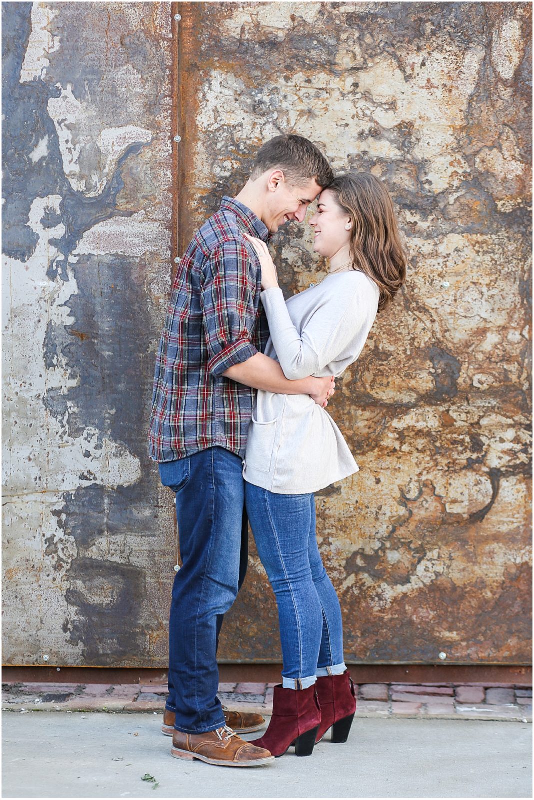 cute couple engagement session ideas - Avery and Jack Engagement Session - Kansas City West Bottoms Engagement Portraits - KC Wedding Photographer - Olathe Lenexa Leawood Kansas Wedding Photography and Video  - Mariam Saifan Photography 