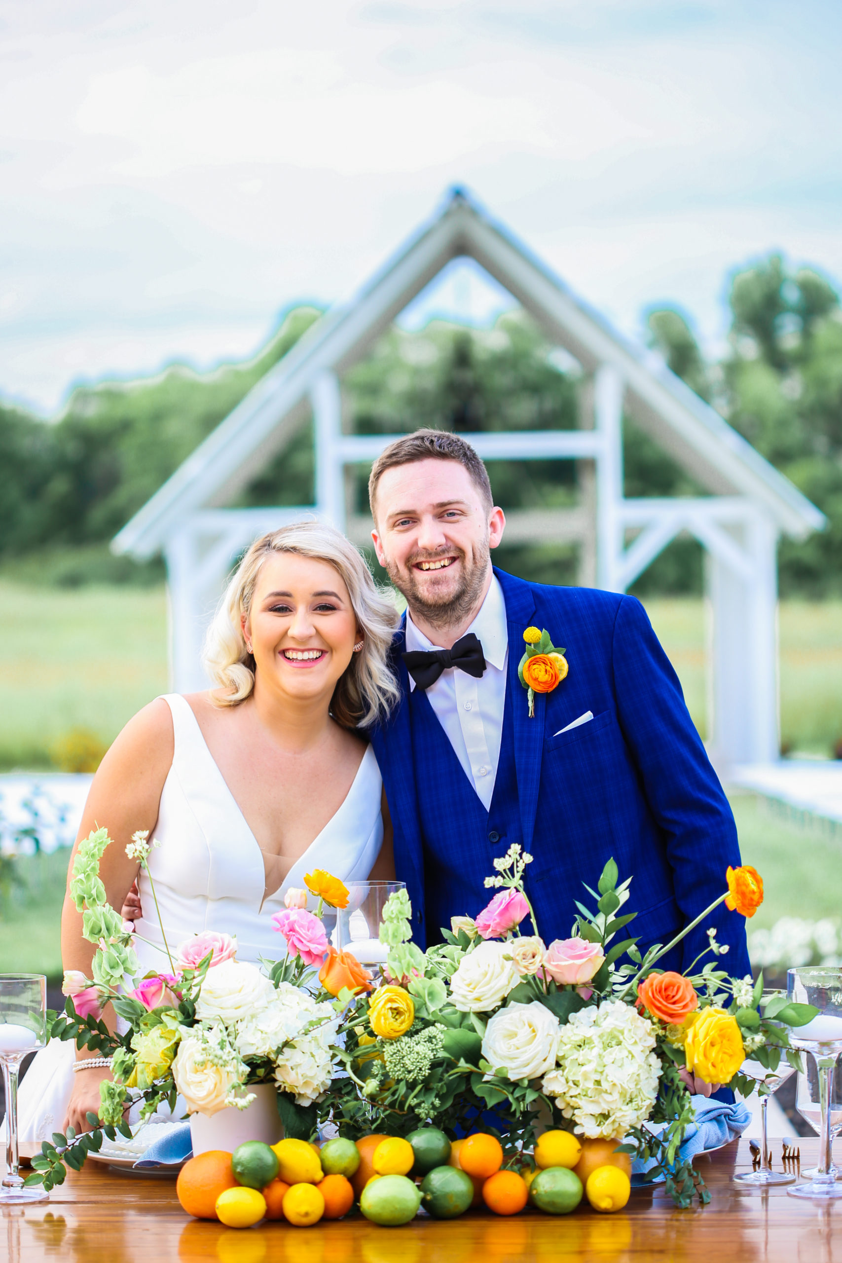 deer ridge estate outdoor summer wedding - colorful bouquet and flowers - bride and groom