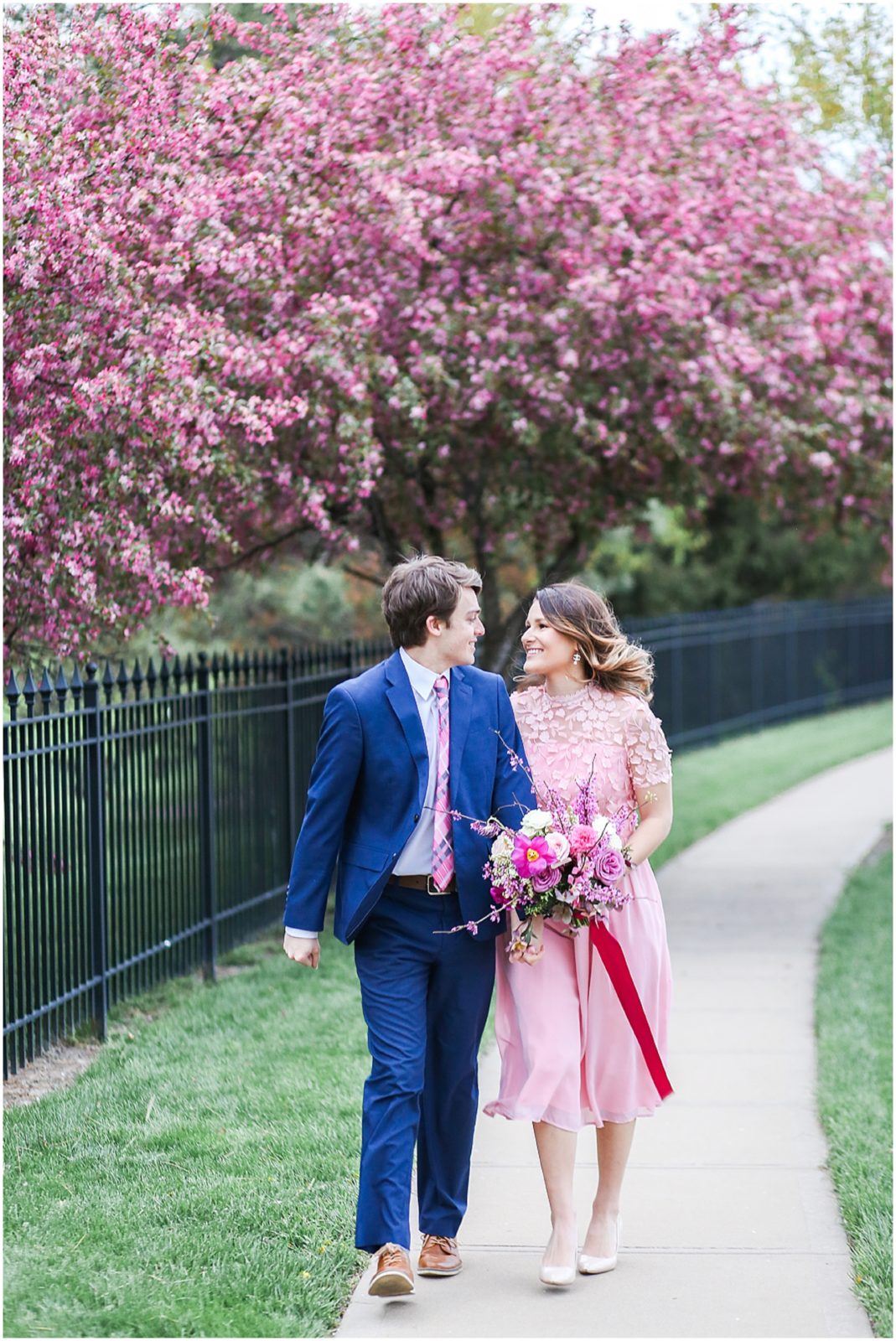 laughing bride and groom engagement session