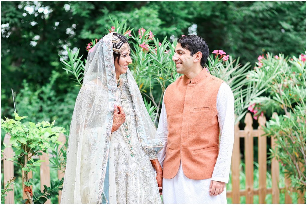 couple smiling at each other - Indian Pakistani Punjabi Wedding Ceremony Nikkah - St. Louis Missouri - STL - Kansas City based Wedding Photographer - Four Seasons Wedding - Hennah Party - Islamic Wedding Ceremony - Mariam and Amaad's Intimate Backyard Wedding 