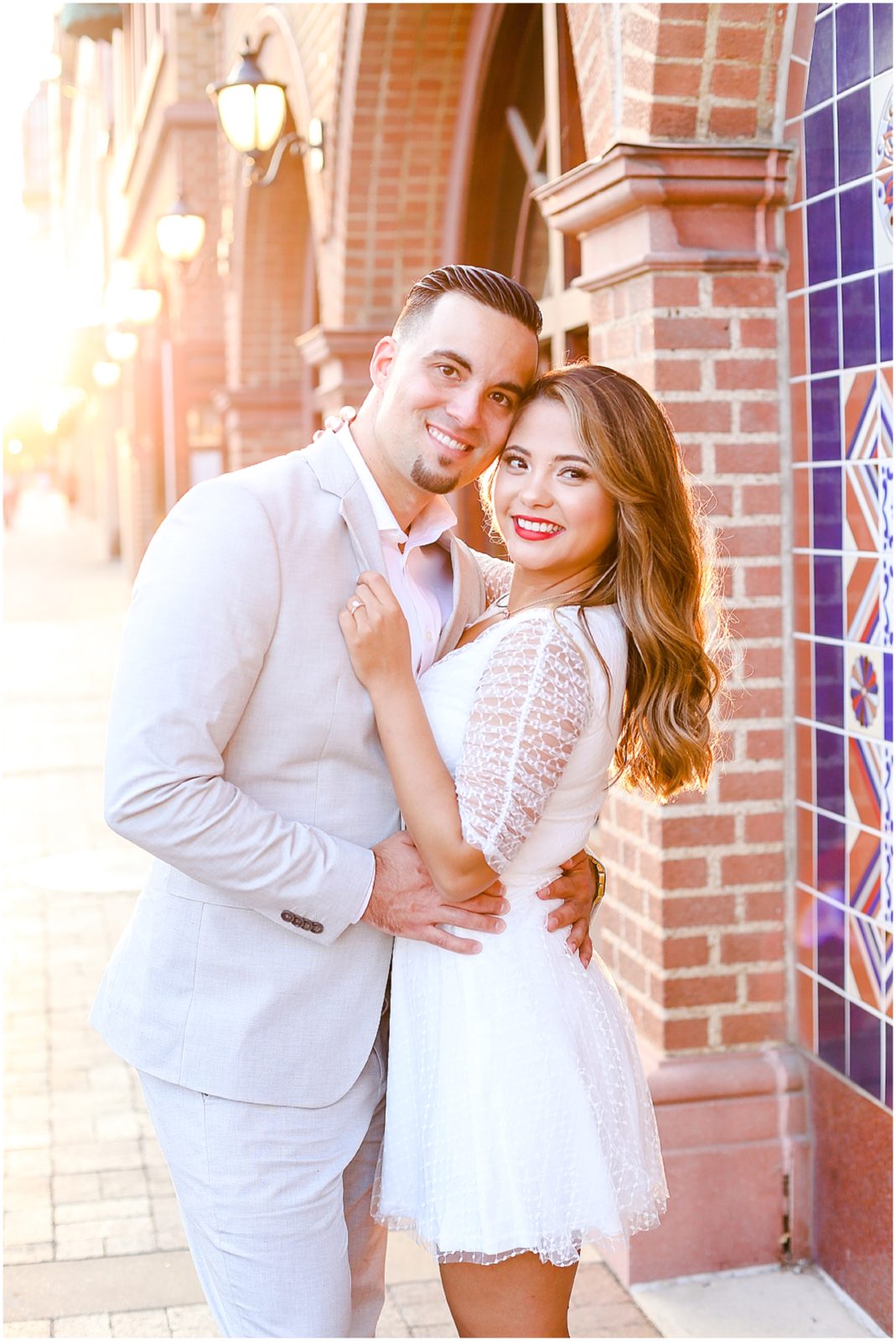 beautiful couple engagement photos at the country club plaza in kansas city and at the liberty memorial - wedding venue at the rhapsody - mariam saifan photography - wedding photographer in KC