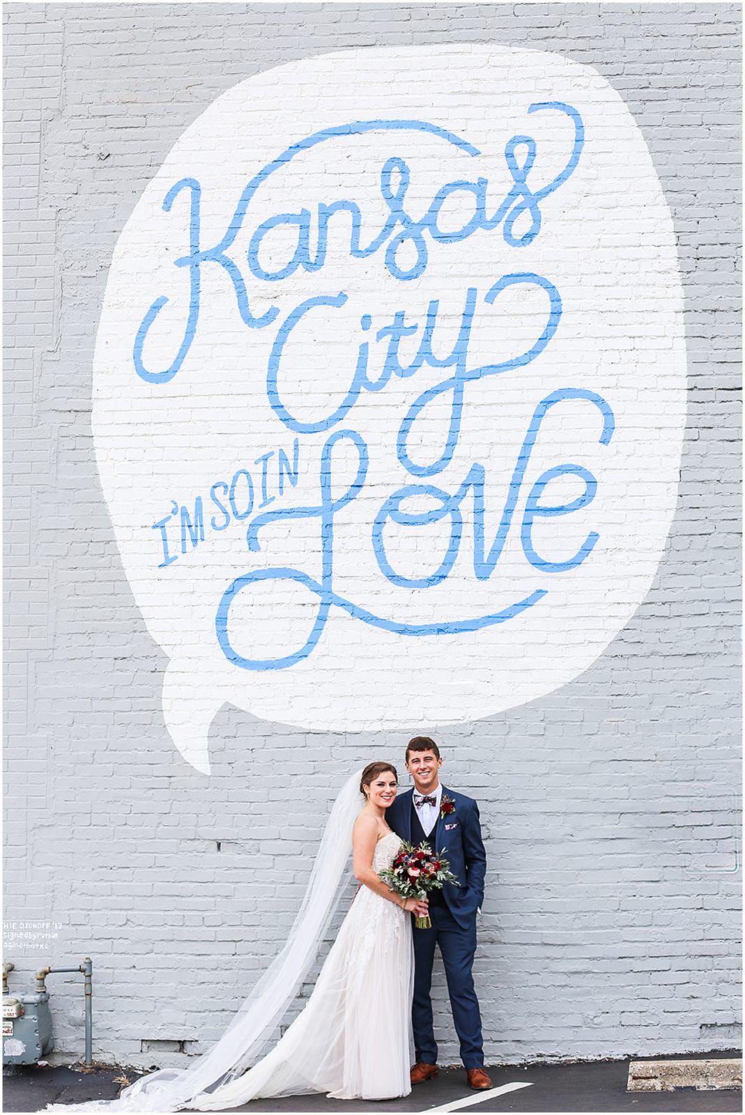 Bride and the Bauer Wedding Photography - Kansas City Wedding Photographer Mariam Saifan Photography - Kansas City West Bottoms and Downtown Wedding Photos - Beautiful Long Wedding  Veil - KC I am so in love Sign