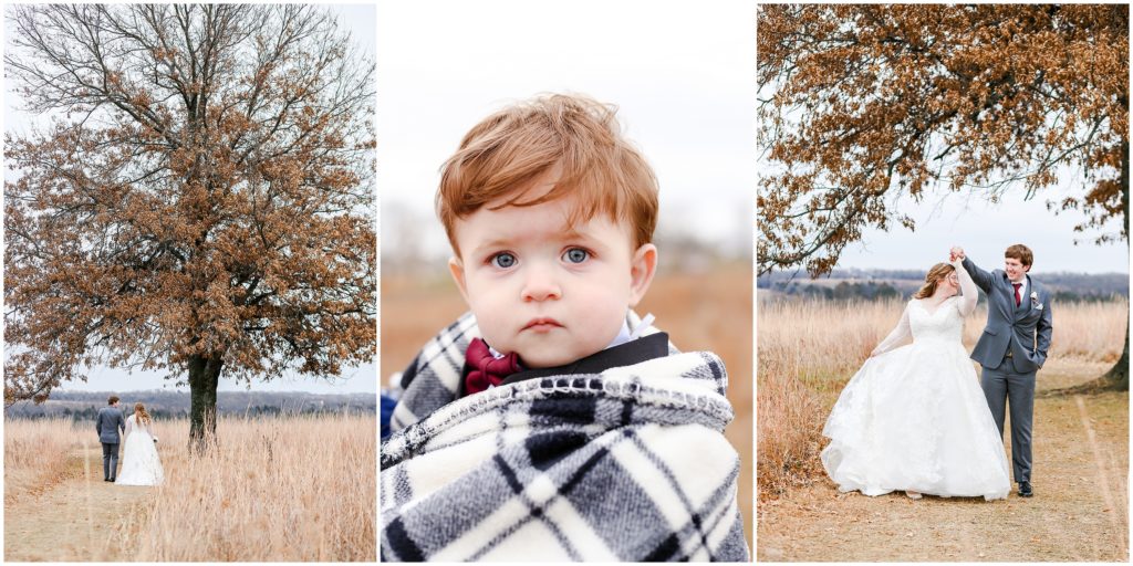 cute baby wrapped up in blanket at his parents wedding 