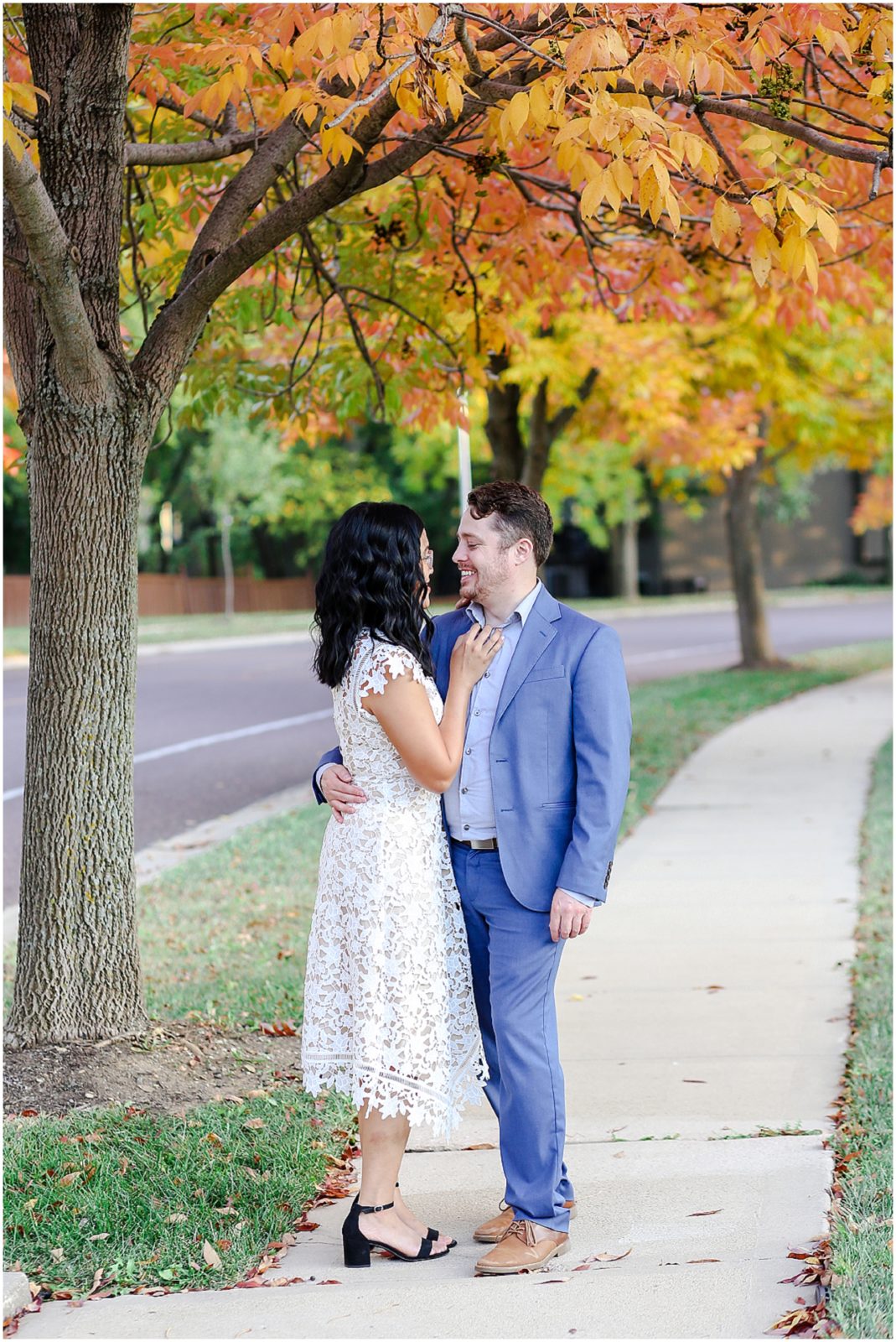 happy couple - how to pose for engagement photos - what to wear for engagement photos - fall foliage - fall engagement photos in kansas city and overland park 