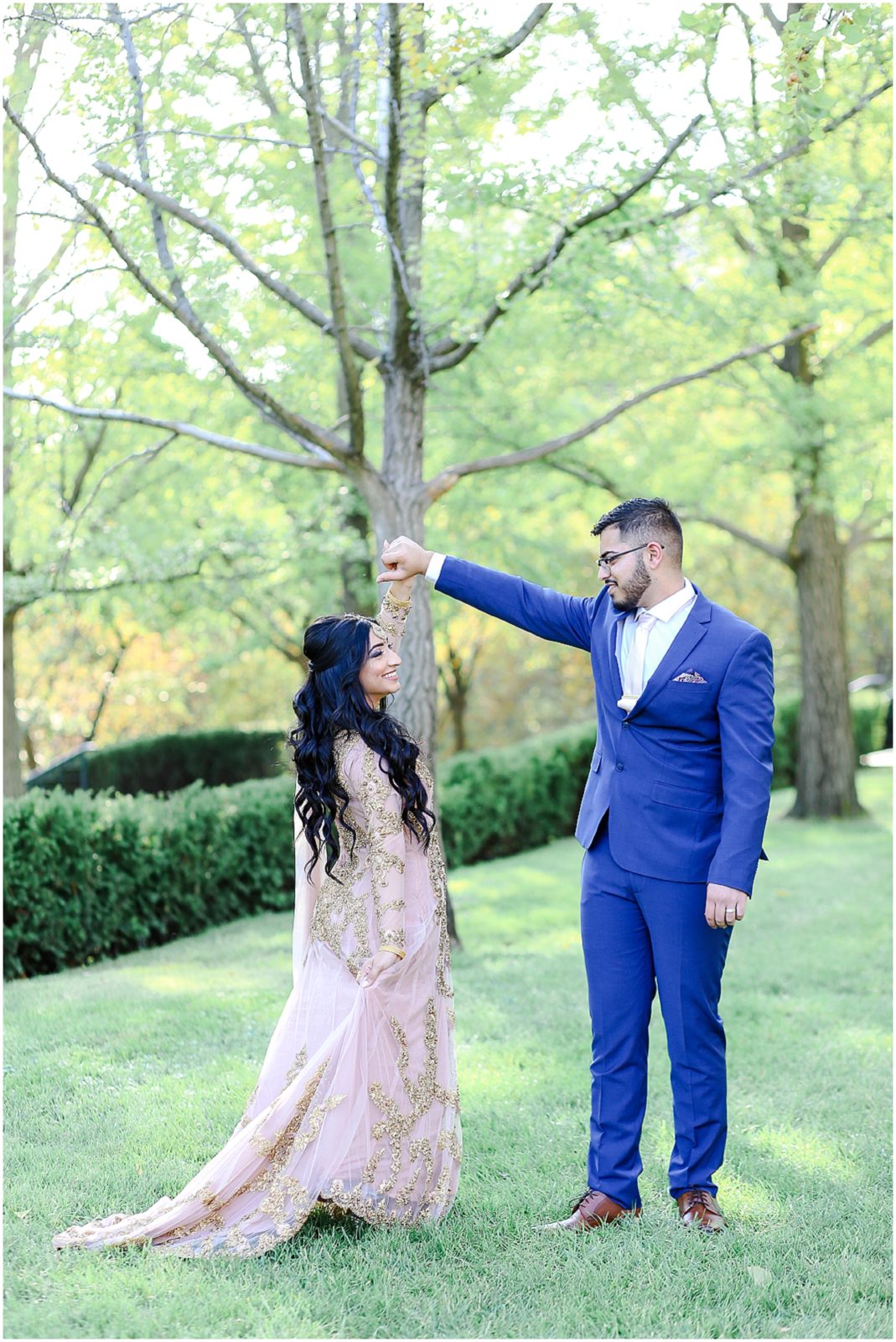 twirling around  for engagement photo 