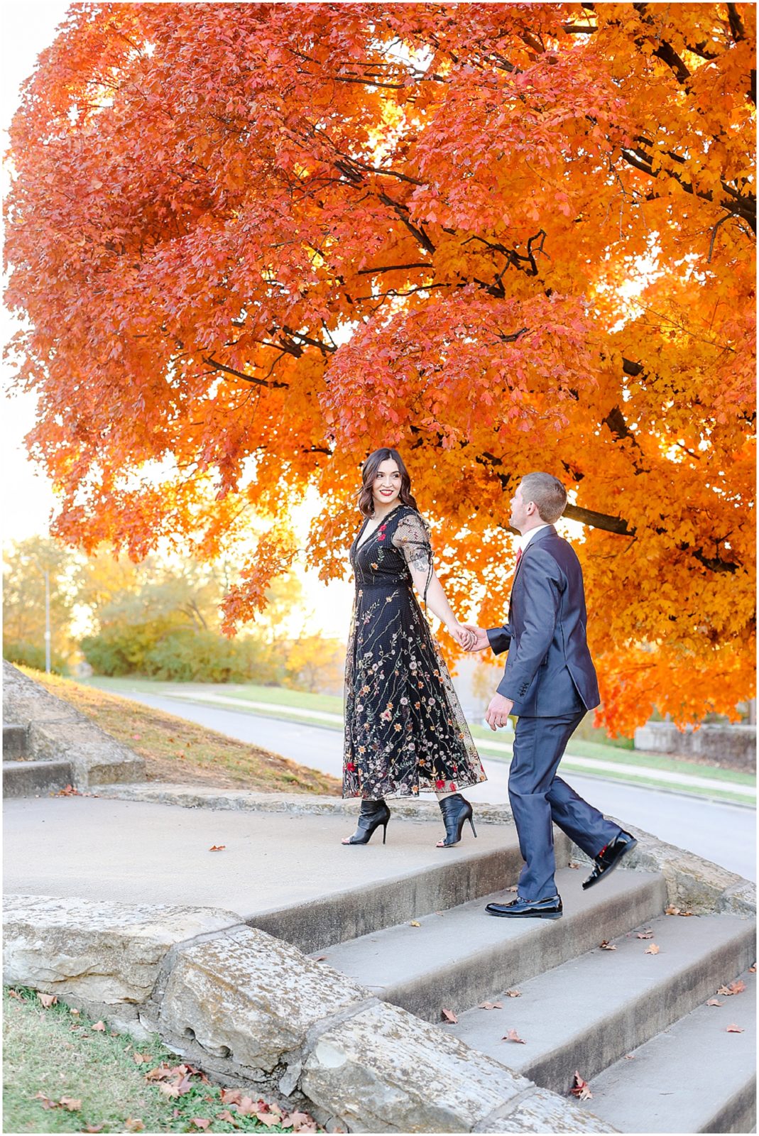 amazing orange fall engagement photos at kansas city liberty memorial 