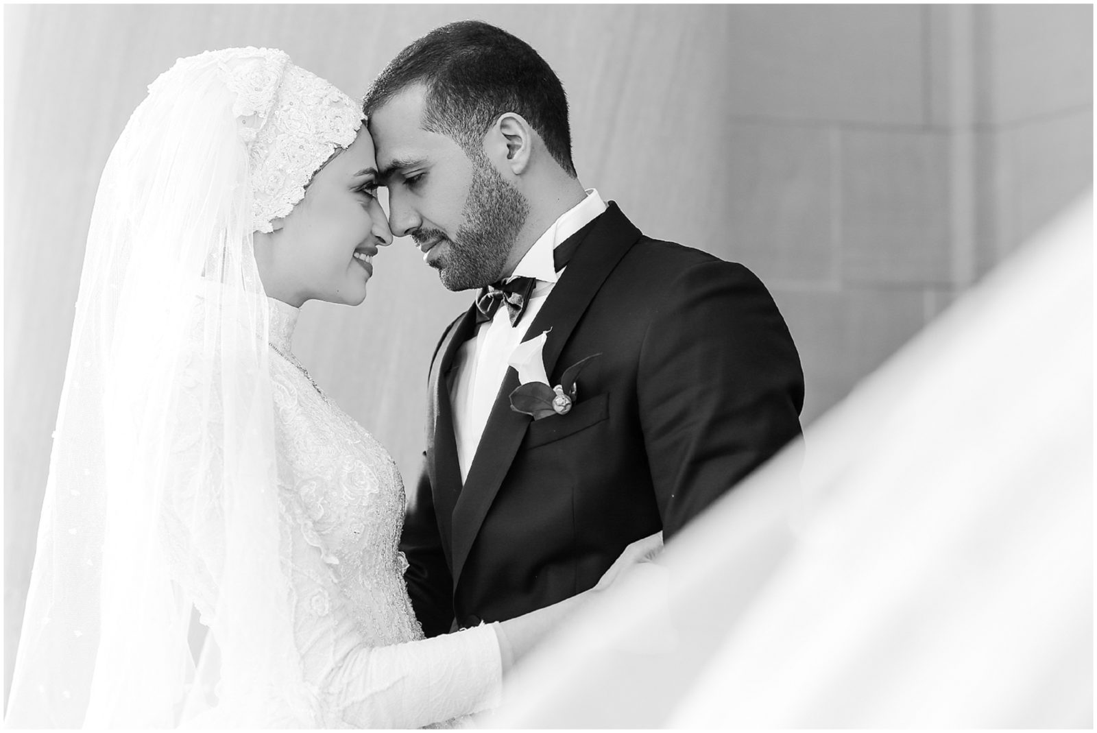 muslim wedding bride and groom taking photos at the kansas city nelson atkins museum by mariam saifan photography 