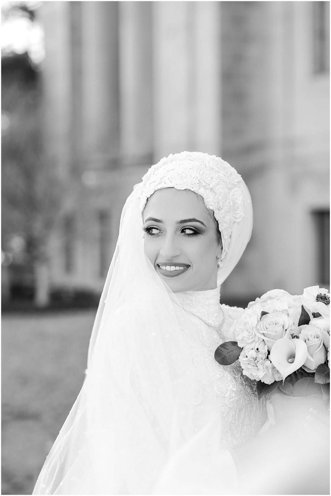 beautiful hijabi muslim bride looking over her shoulder 