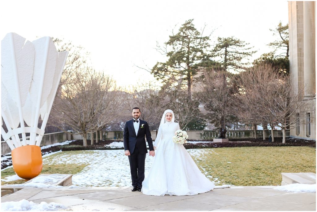 wedding couple holding hands 