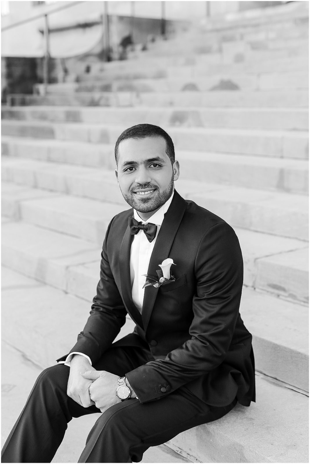 groom on steps 