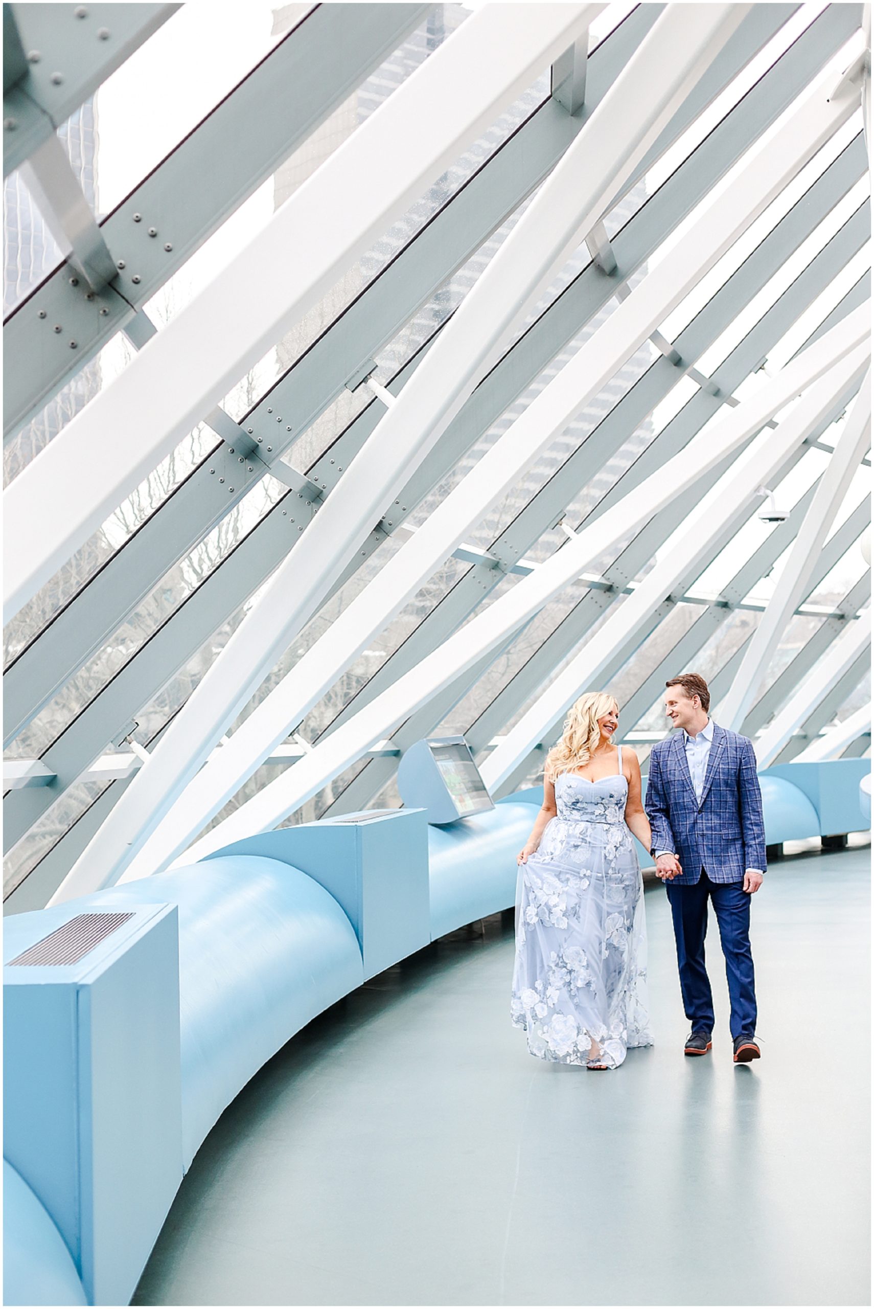 crown center kansas city engagement photos with beautiful blue dress - walking photos 