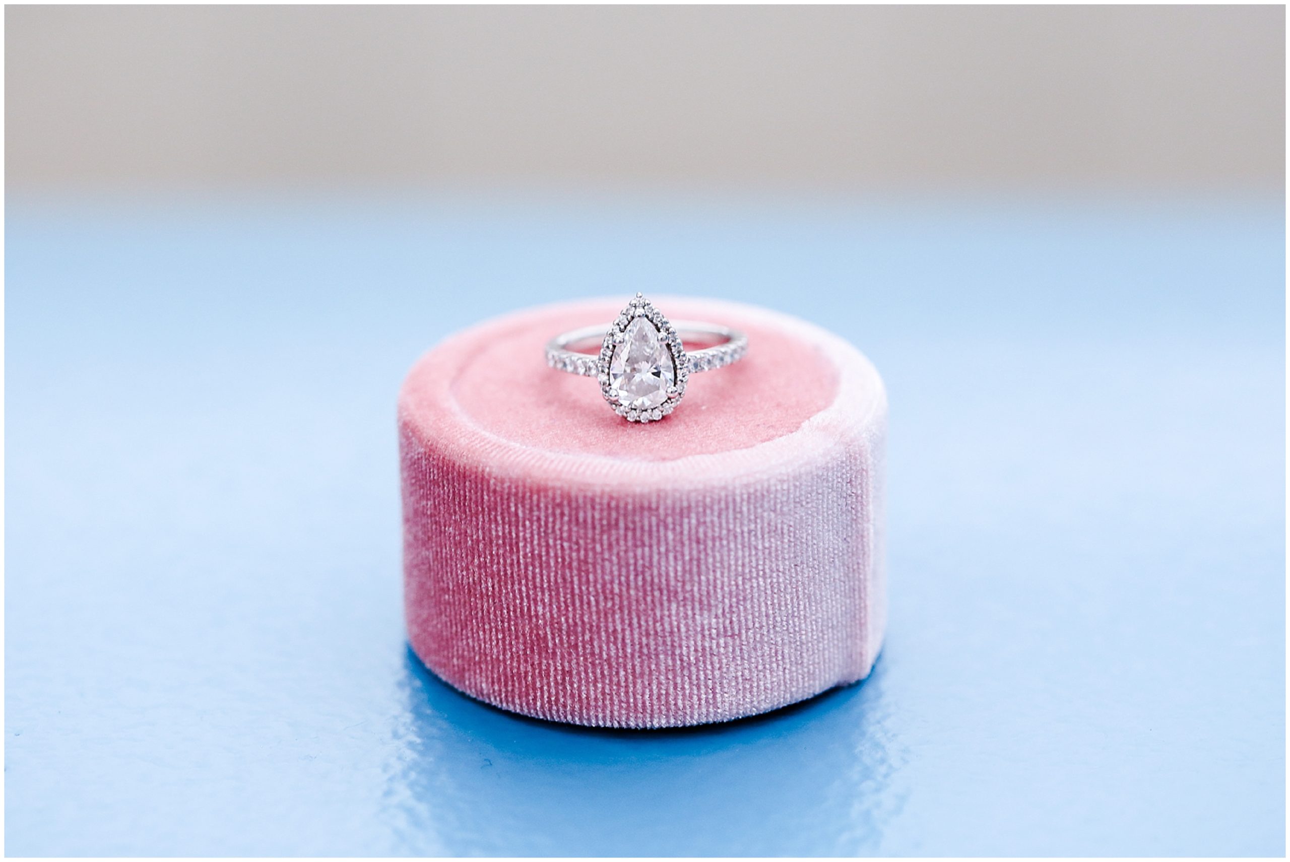 tear drop engagement ring with pink ring box - kansas city engagement photos