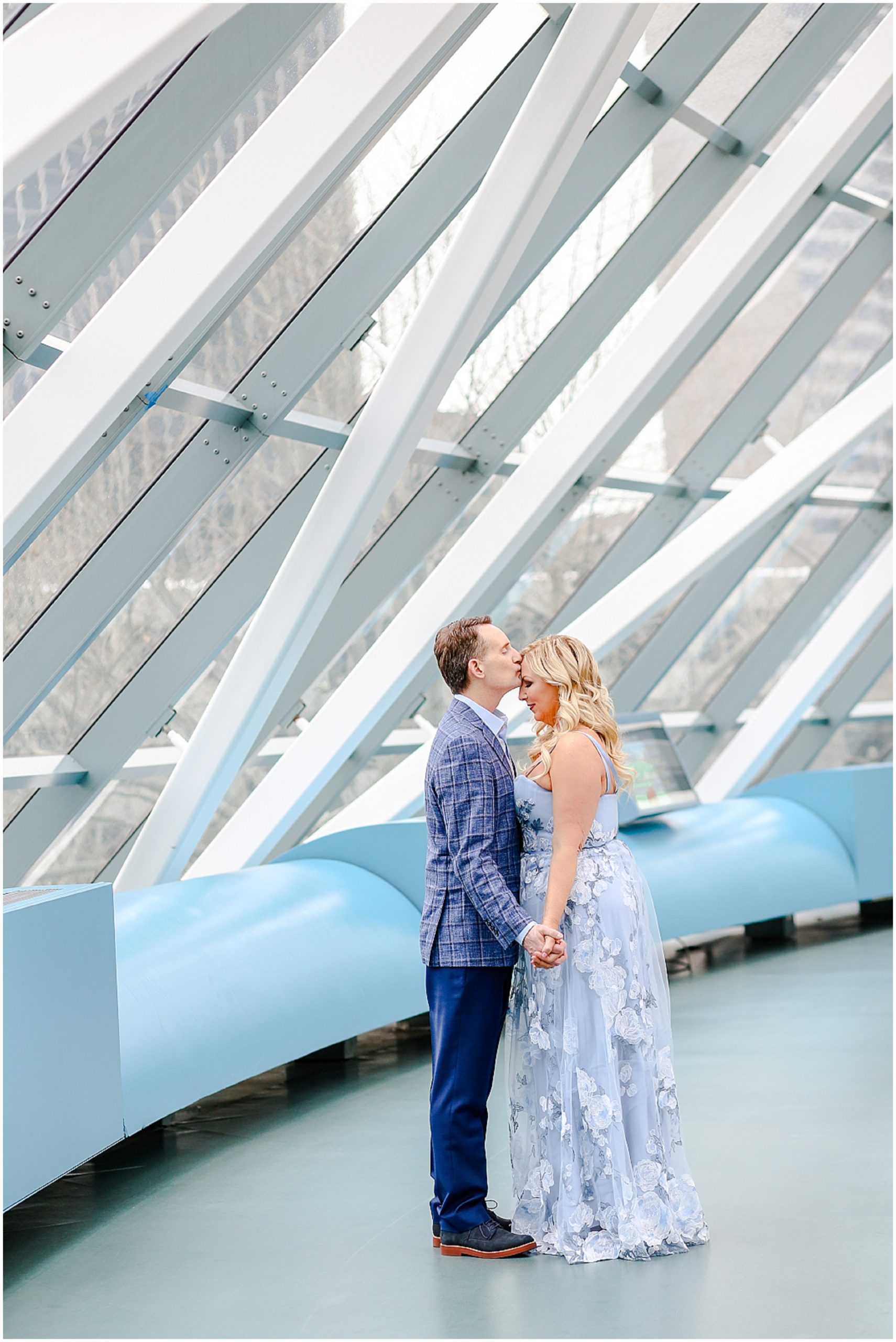 kissing forehead wedding photo idea