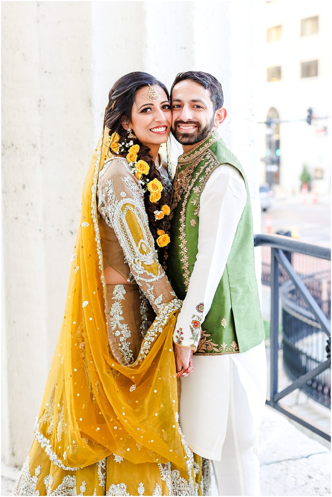 stl arch wedding photographer - couple holding hands