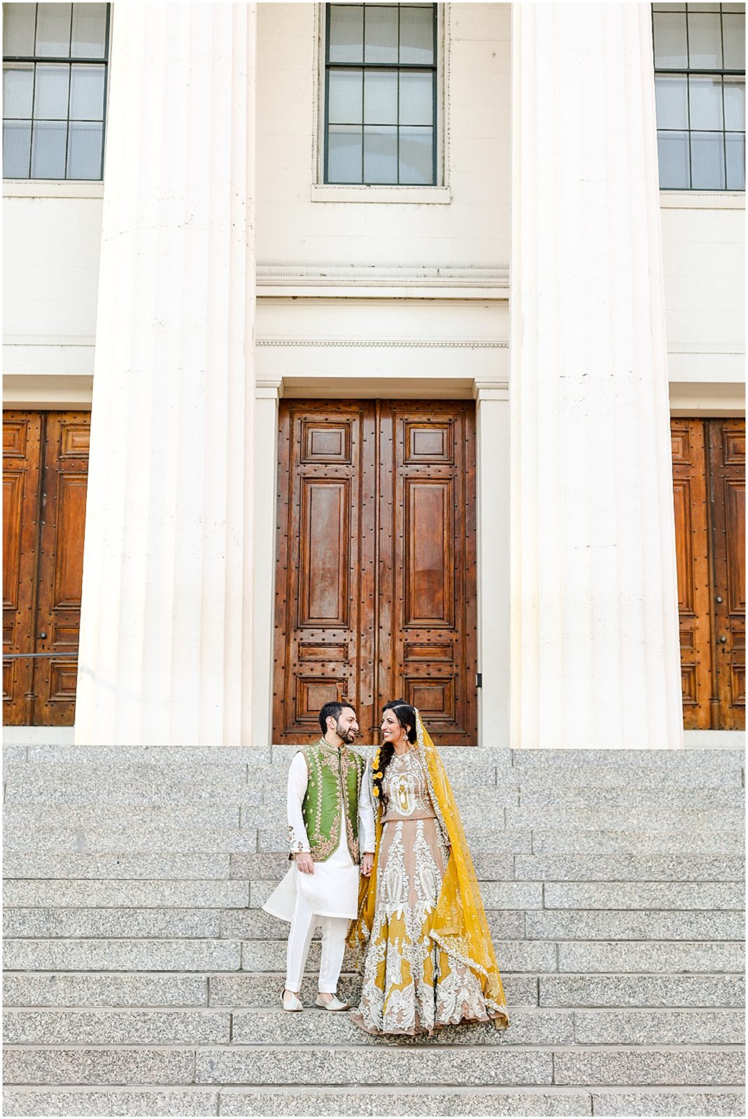 couple walking down stairs at st.louis archway