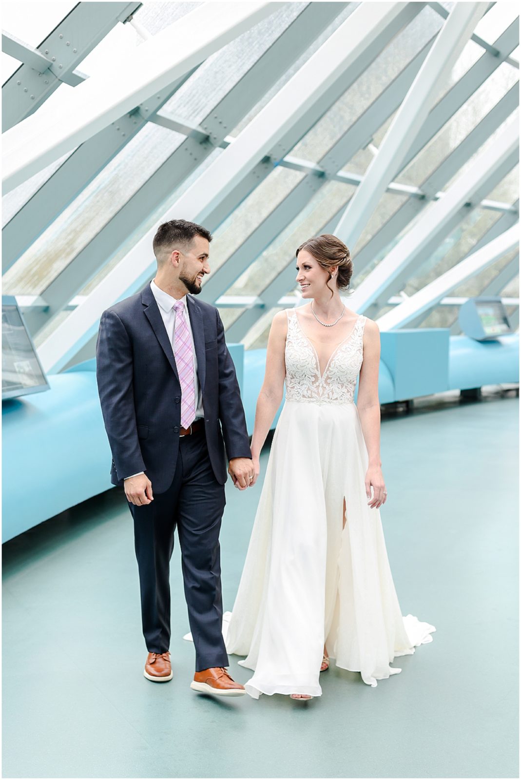 couple walking - Westin Crown Center Wedding Photos in Kansas City