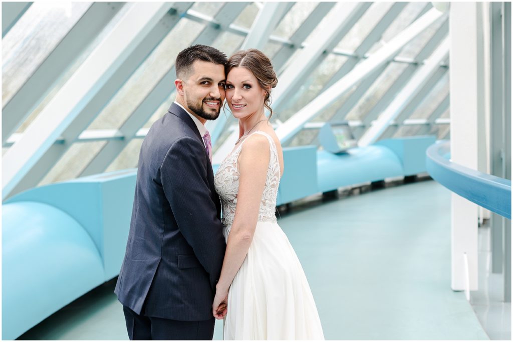 wedding couple looking over their shoulder