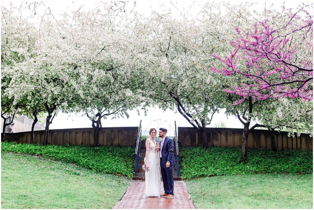 walking in the rain with umbrella - wedding