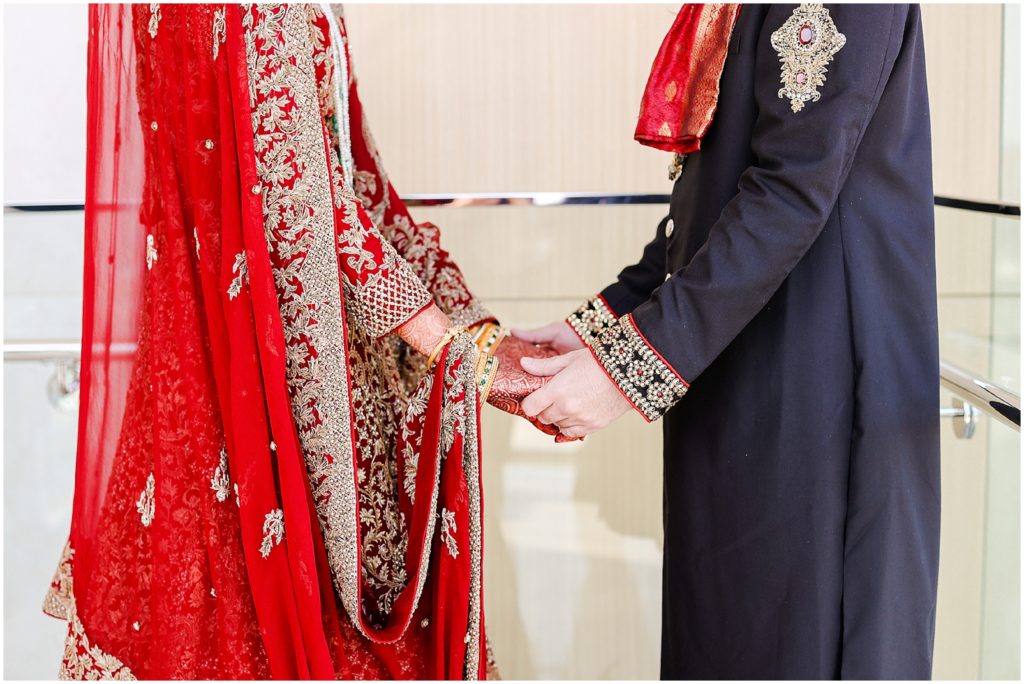 holding hands - indian pakistani wedding