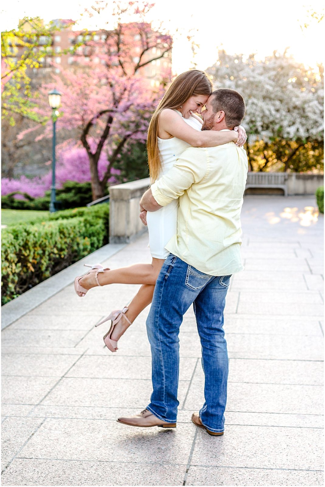 having fun at their engagement session