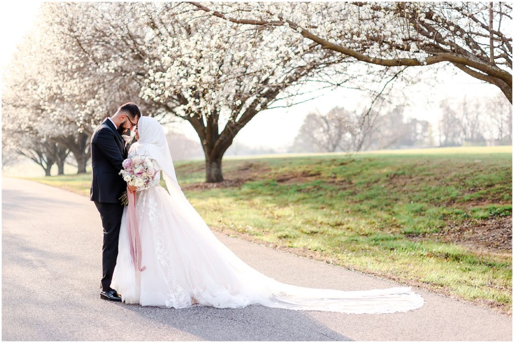 arab wedding portraits of bride and groom at shawnee mission park in kansas