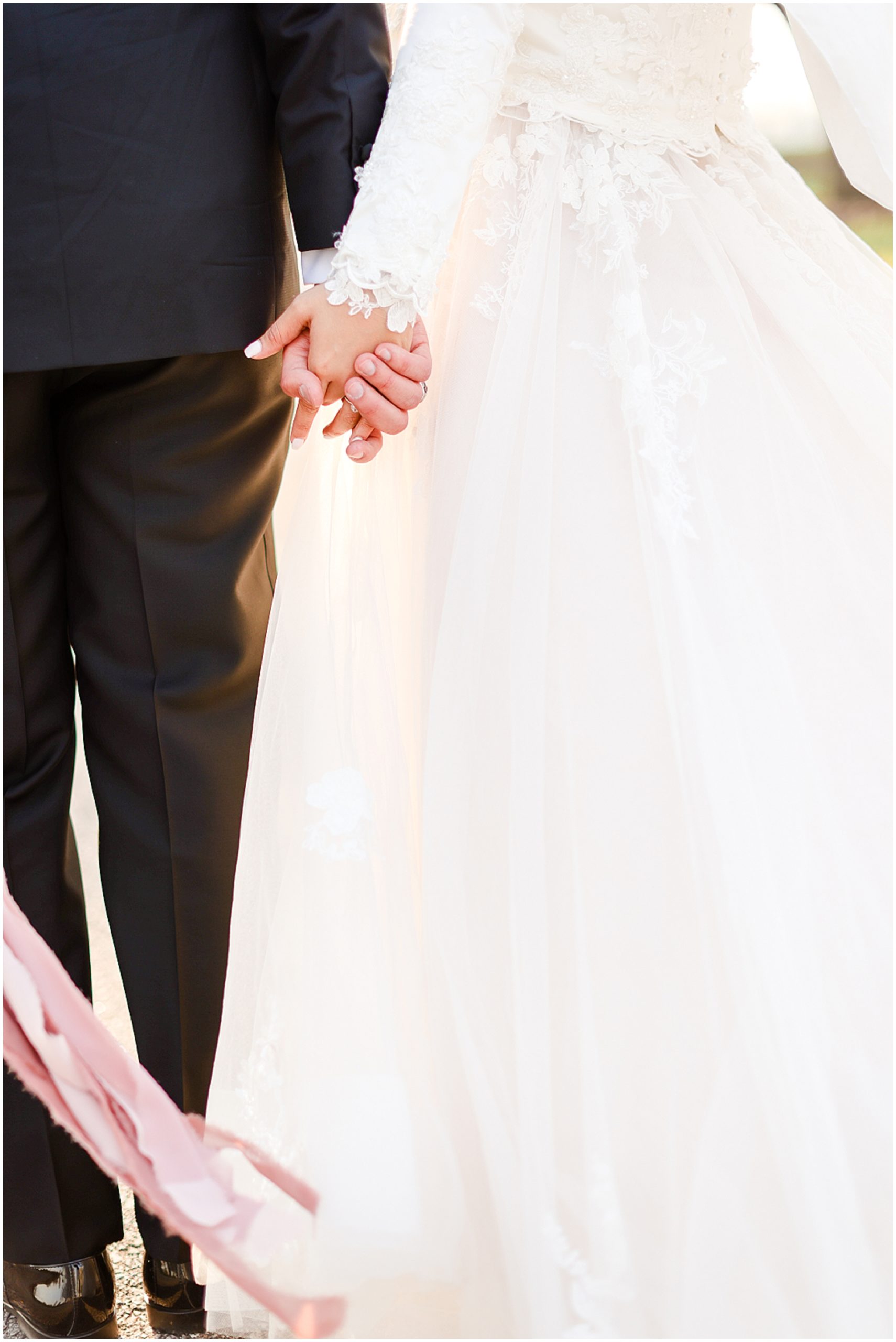 holding hands kansas wedding