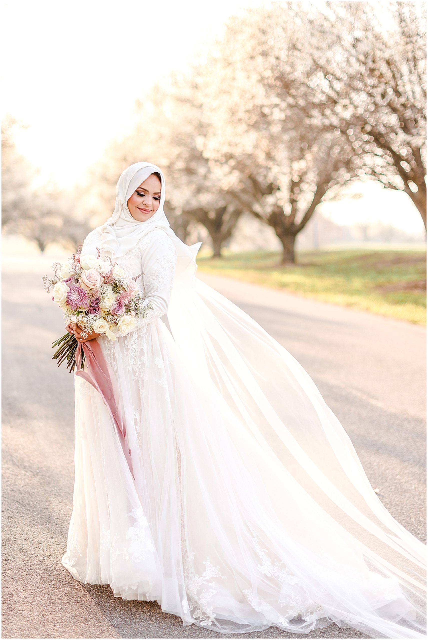 beautiful muslim arab bride with long wedding veil - dreamy wedding photos at kansas shawnee mission park