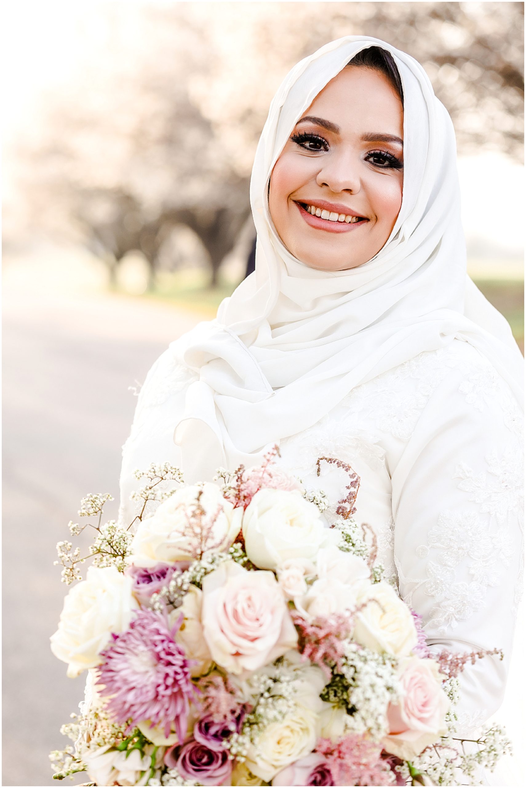beautiful muslim arab bride with long wedding veil - dreamy wedding photos at kansas shawnee mission park