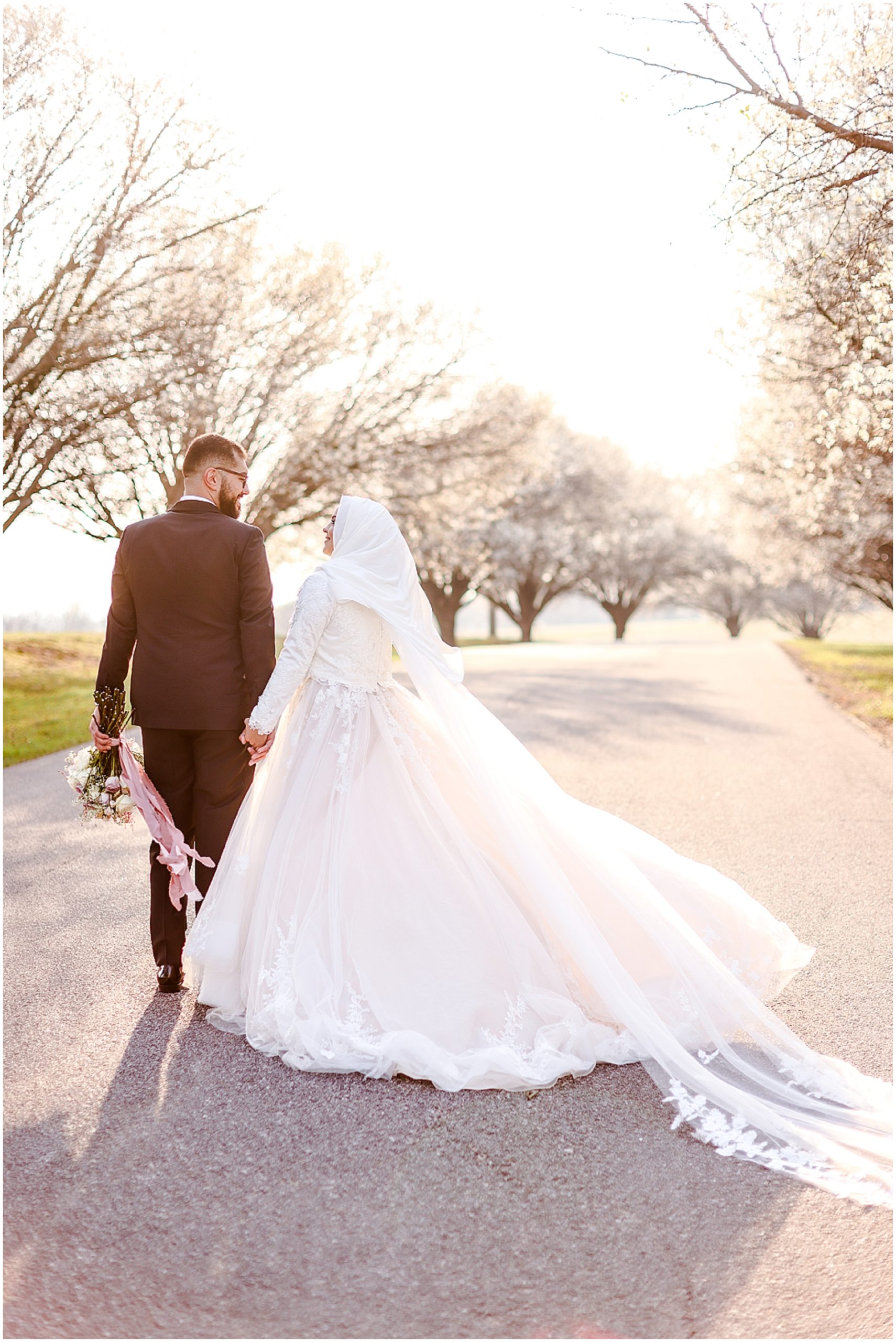 beautiful muslim arab bride with long wedding veil - dreamy wedding photos at kansas shawnee mission park