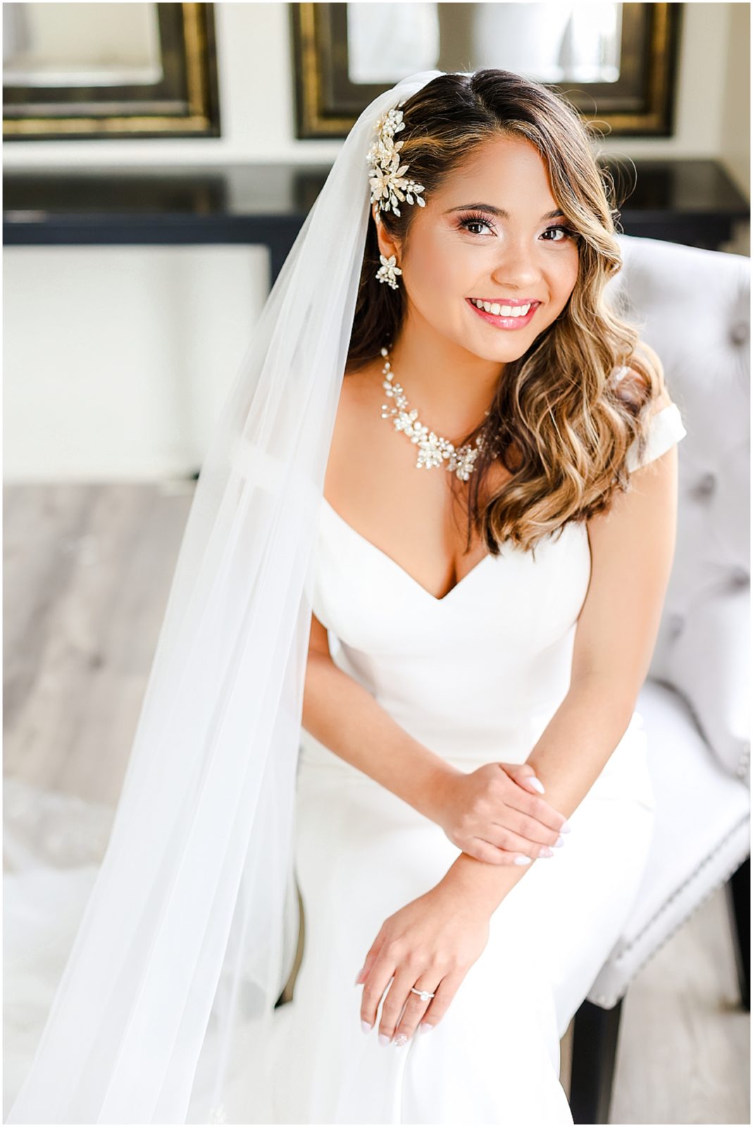 beautiful bride getting ready for photos at the rhapsody wedding event space - mariam saifan photography - kansas city wedding photographer