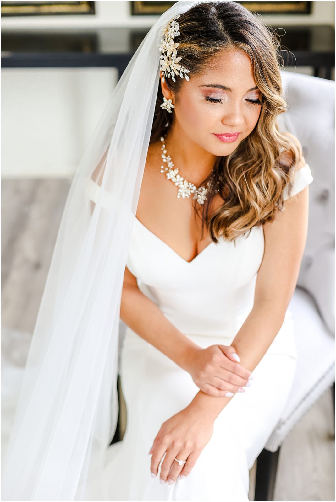 beautiful bride getting ready for photos at the rhapsody wedding event space - mariam saifan photography - kansas city wedding photographer