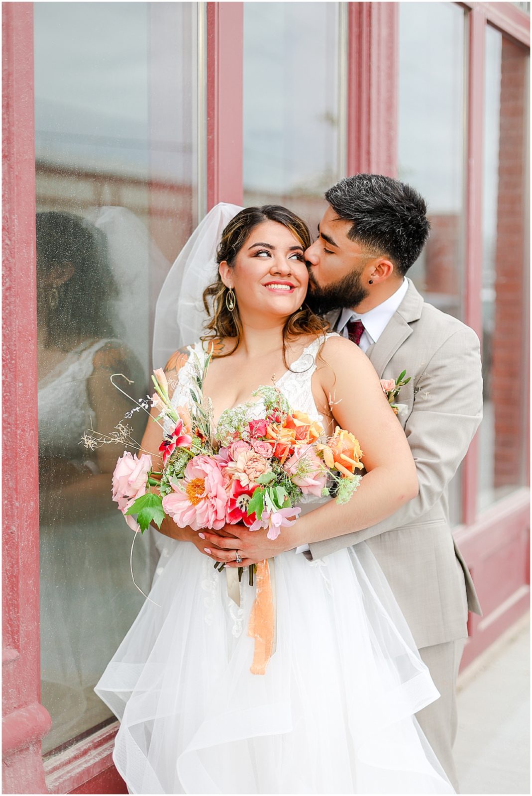 bride and groom walking downtown - where to take photos in kc