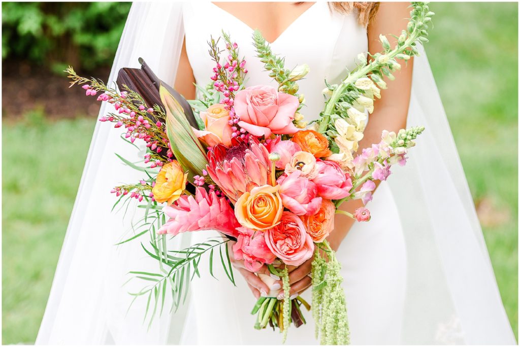 Gorgeous Bride & Groom Wedding Photos taken at the Kansas City Wedding Venue - Rhapsody - by Mariam Saifan Photography - Long Wedding Veil - Lace Wedding Dress - Tropical Wedding Theme