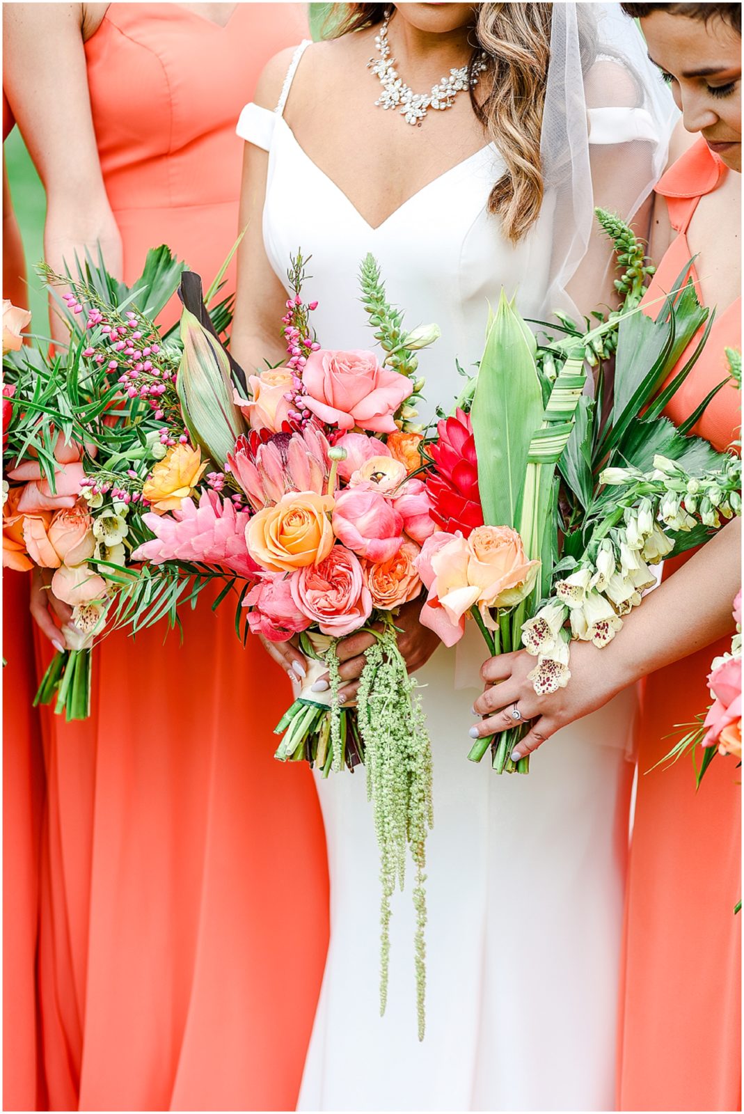 wedding bouquet inspiration - Gorgeous Bride & Groom Wedding Photos taken at the Kansas City Wedding Venue - Rhapsody - by Mariam Saifan Photography - Long Wedding Veil - Lace Wedding Dress - Tropical Wedding Theme 