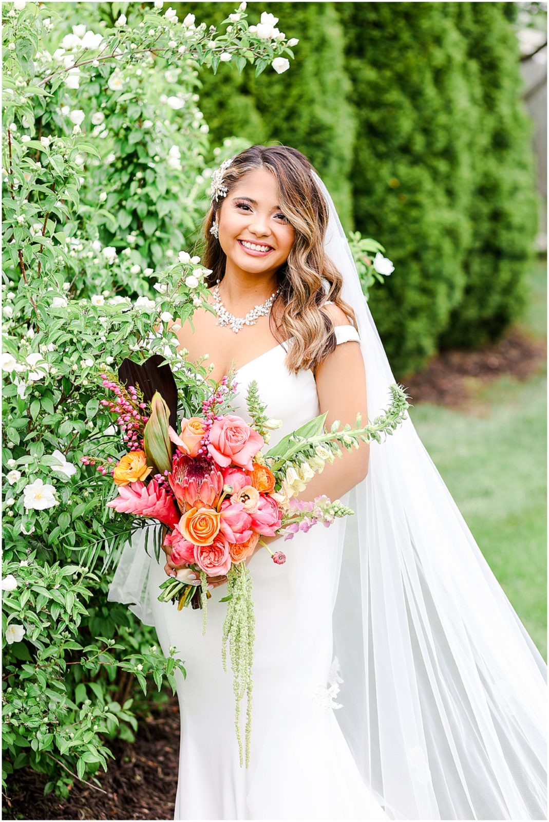 Beautiful bride - Wedding at the Kansas City Rhapsody Event Space with tropical Hawaiian wedding - long veil wedding dress - wedding photography by Mariam saifan photography