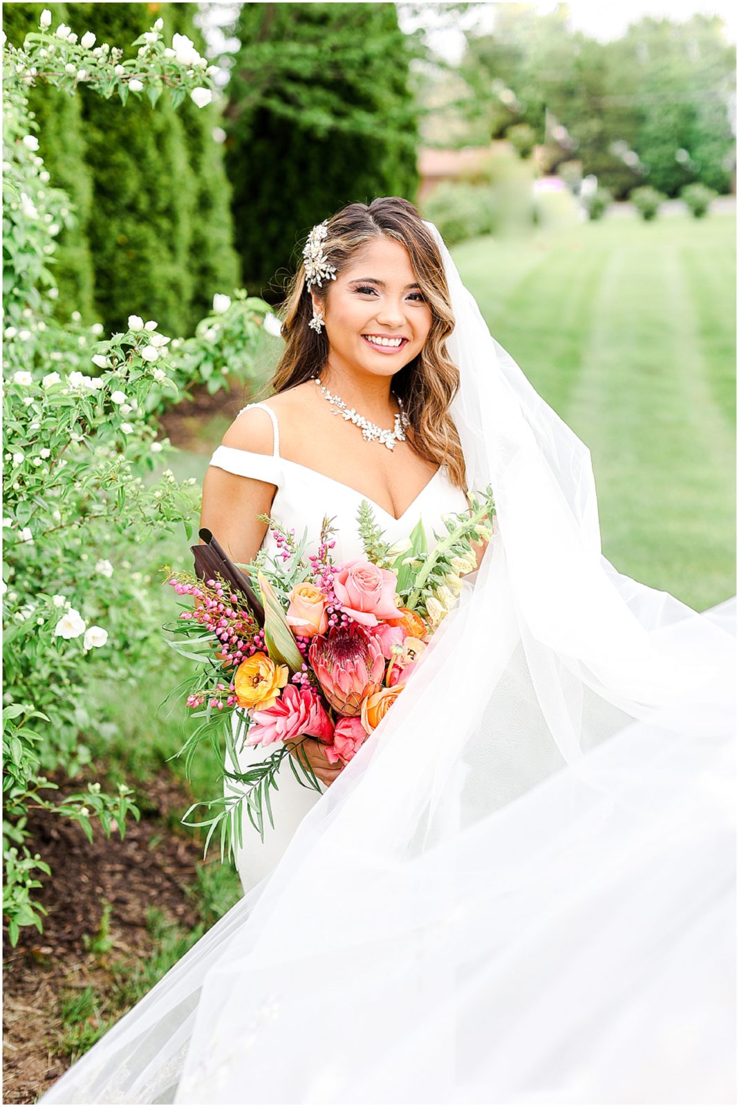 Beautiful bride - Wedding at the Kansas City Rhapsody Event Space with tropical Hawaiian wedding - long veil wedding dress - wedding photography by Mariam saifan photography