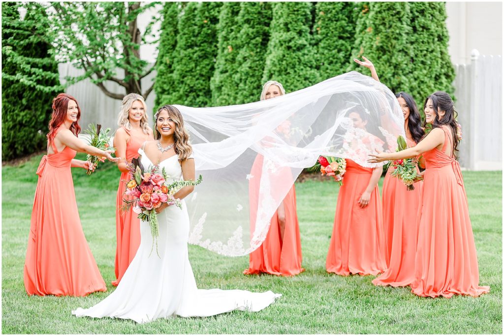 Beautiful bride - Wedding at the Kansas City Rhapsody Event Space with tropical Hawaiian wedding - long veil wedding dress - wedding photography by Mariam saifan photography