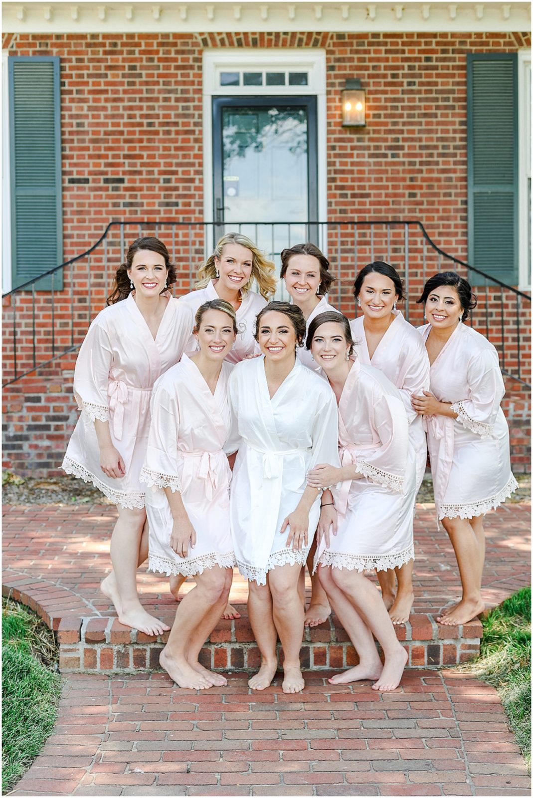 bridal party wearing robes for photos