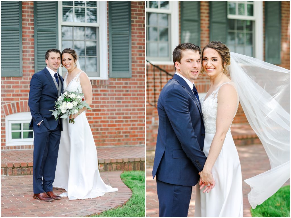 bride and groom with brick house
