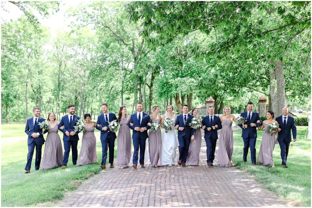 walking bridal party at farm venue in kansas mildale farms