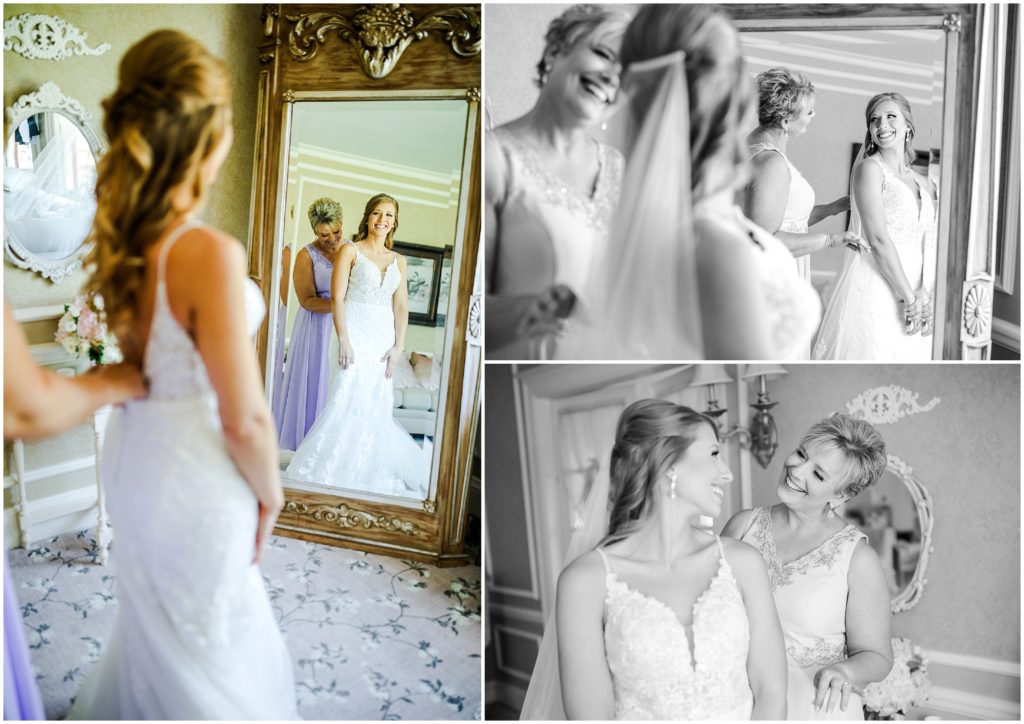 mom helping daughter get dressed for wedding at longview mansion