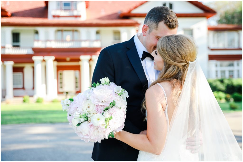 bride and groom wedding portraits at longview mansion 